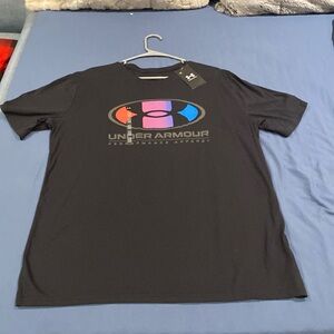 UA brand new tee says 3x but fits like a large